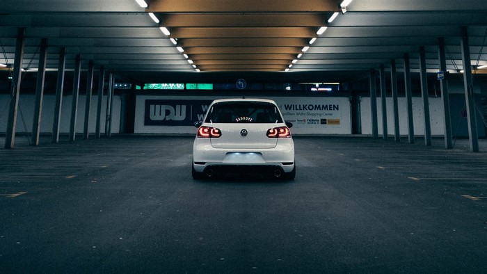White Volkswagen Golf GTI in Parking Garage
