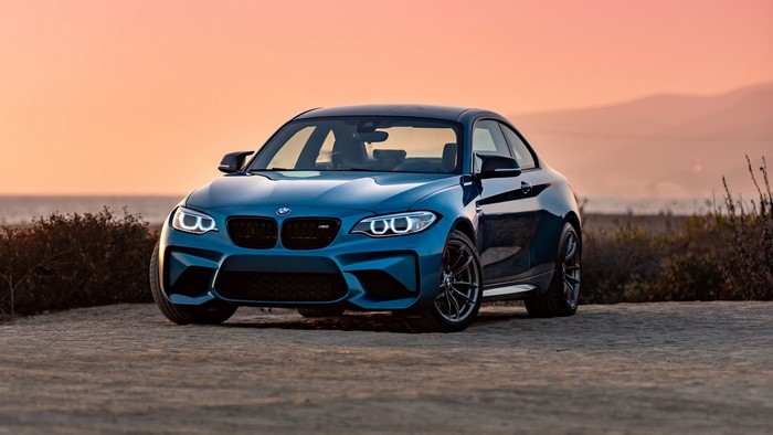 Blue BMW M2 Coupe on Beach at Sunset