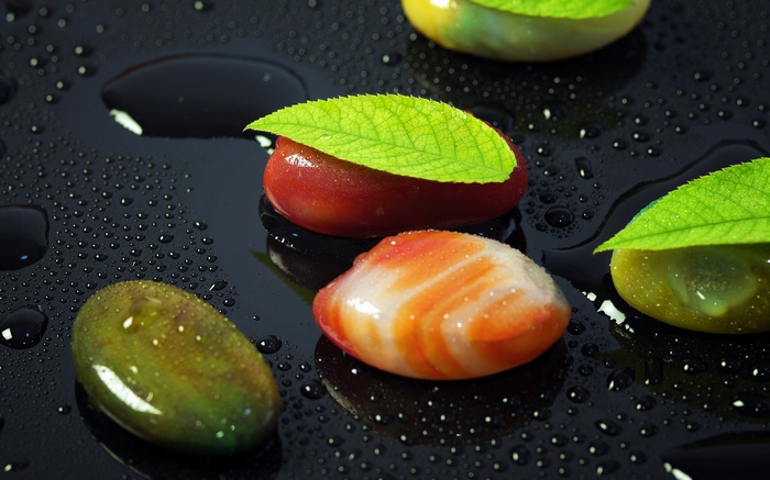 Gems with leaves and water droplets