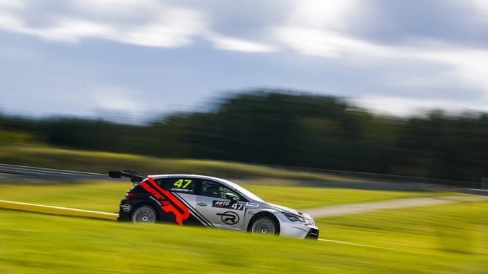 Race car with number 47 on a track