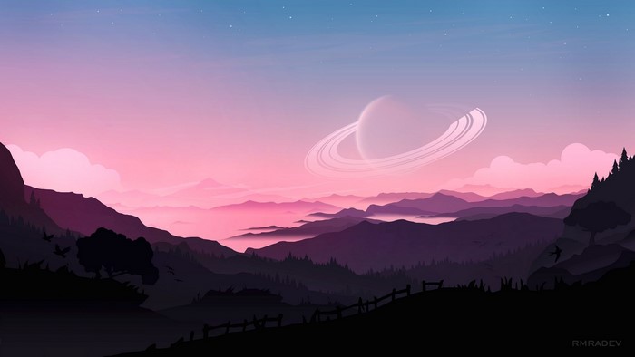 Saturn over a misty mountain landscape