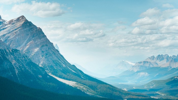 Majestic mountains under a cloudy sky