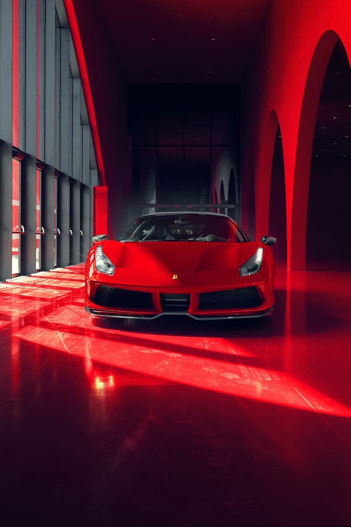 Red Ferrari 488 GTB in a Modern Showroom