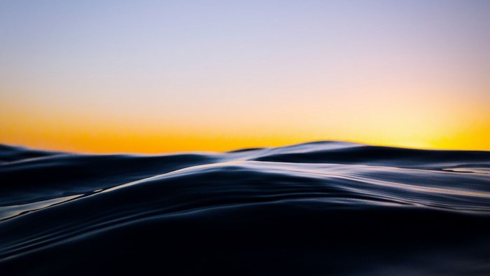 Ocean waves at sunset