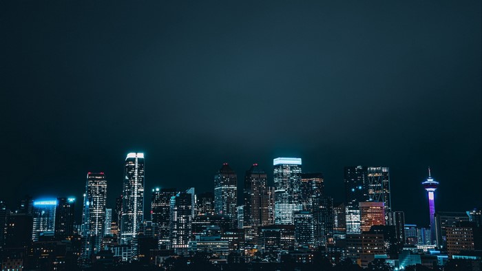 Night cityscape with illuminated skyscrapers