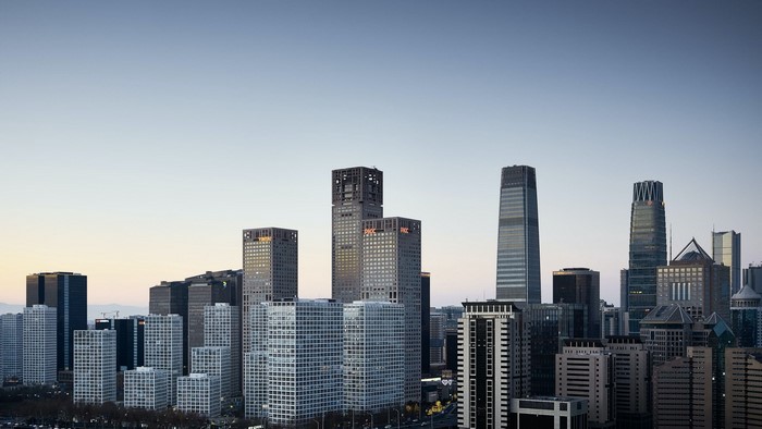Skyscrapers in a city skyline at dusk