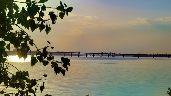Bridge over a river at sunset