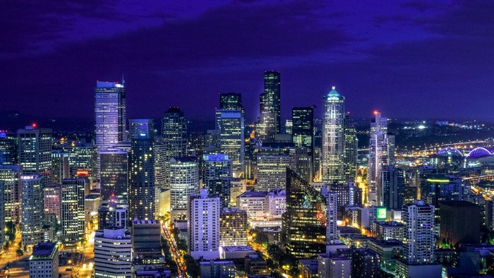 Night cityscape with illuminated skyscrapers
