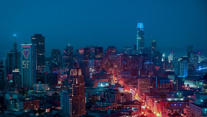 Night cityscape with illuminated skyscrapers