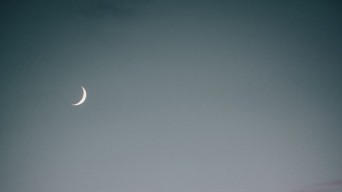 Crescent Moon in a Teal Sky