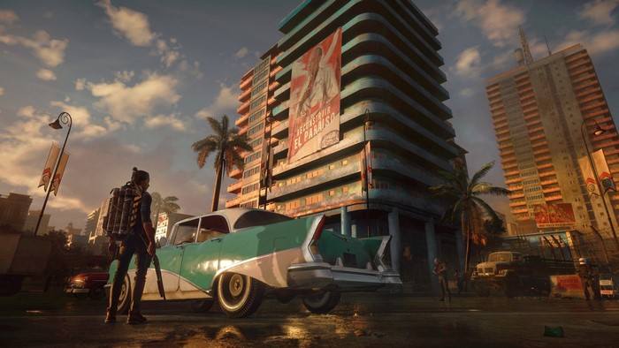 Far Cry 6 character with vintage car in city