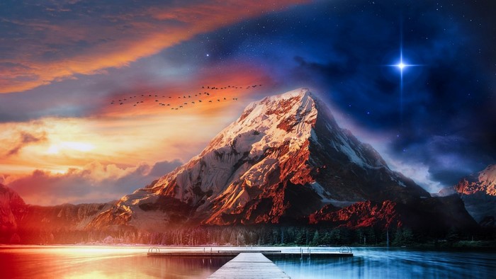 Mountain peak under starry sky with birds flying