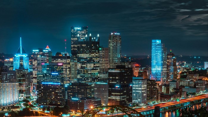 Pittsburgh skyline at night with UPMC buildings