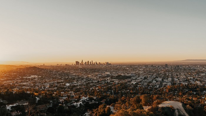 Los Angeles skyline at sunset from a hilltop