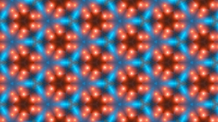 Abstract pattern of glowing orange and blue lights