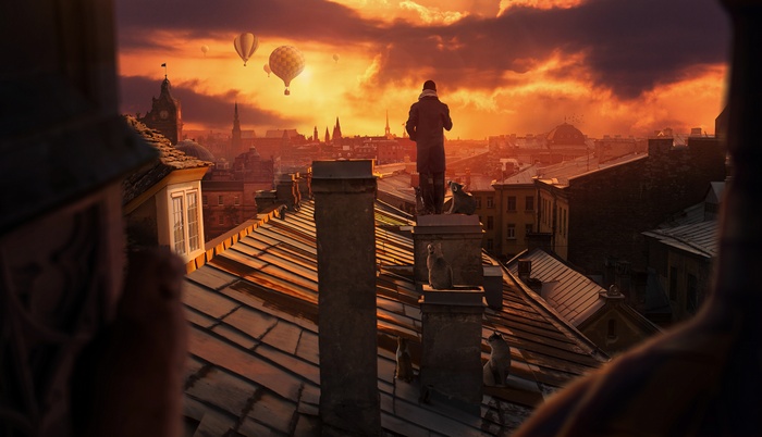 Sunset over city rooftops with hot air balloons