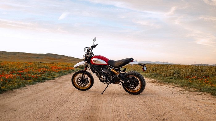 Ducati Scrambler motorcycle on a dirt road
