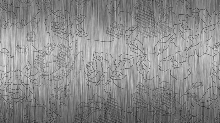Metal texture with embossed floral pattern
