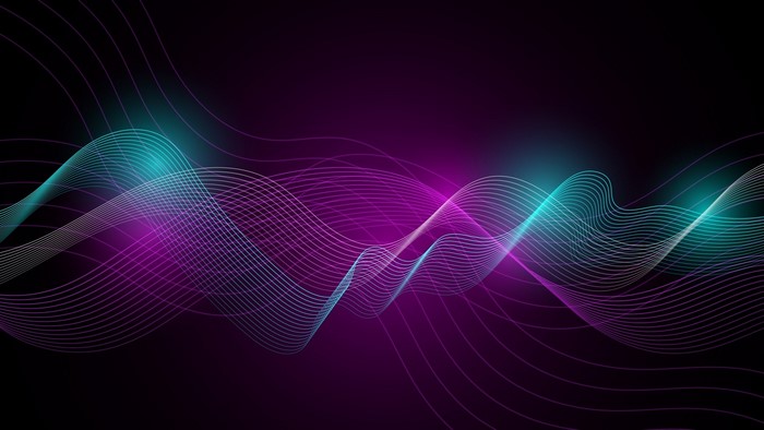 Abstract waves of purple and teal light
