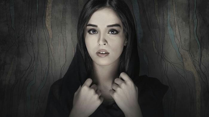 Woman in black hijab
