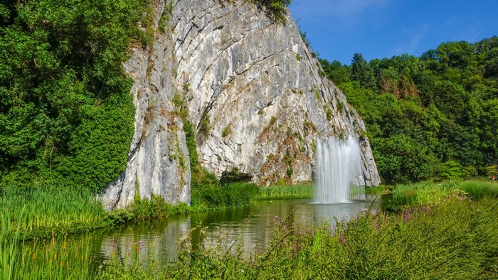 4K Landscape park with rock face and fountain