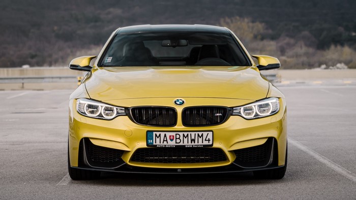 Yellow BMW M4 Coupe
