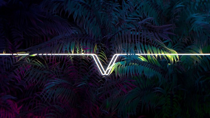 Neon V symbol on tropical leaves