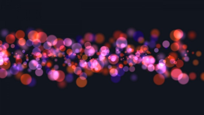 Abstract bokeh lights in red, pink, and purple