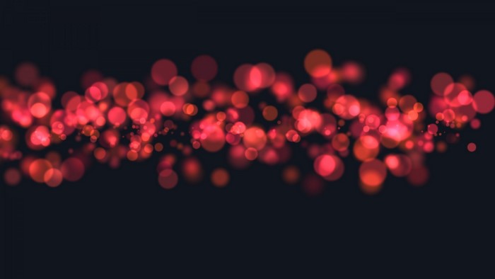 Red Glitter Bokeh Effect on Dark Background