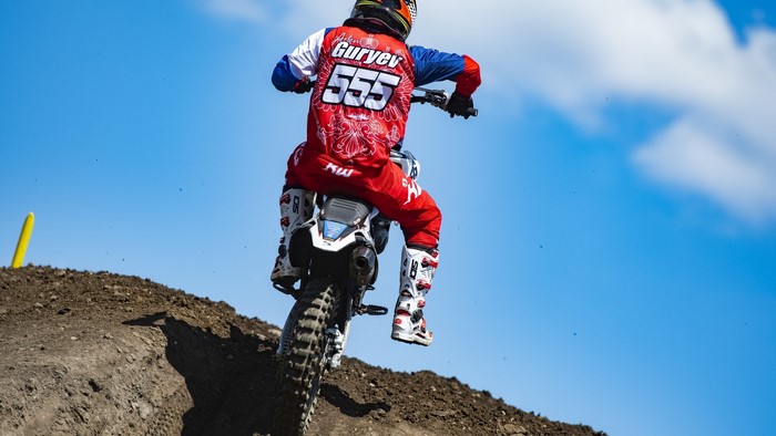 Motocross rider Gurvey 555 in action