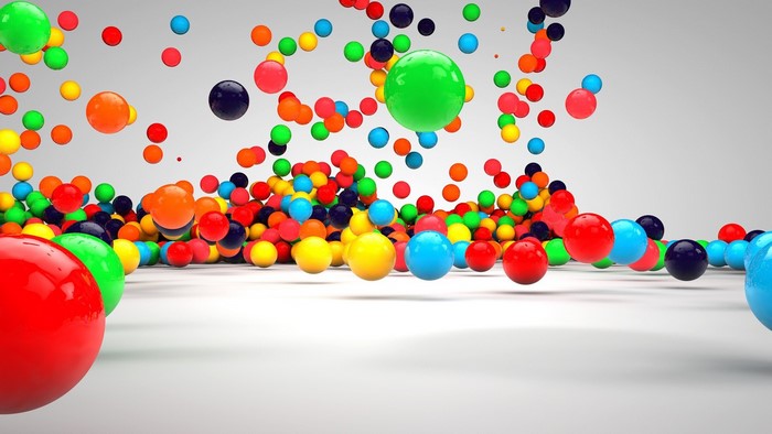 Colorful 3D spheres falling and bouncing