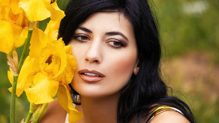 Woman with yellow flowers