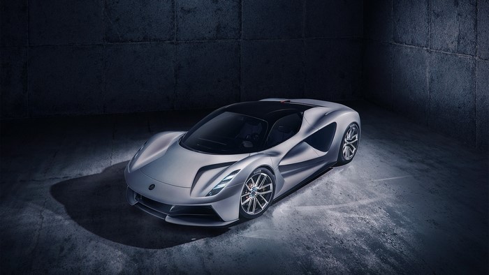 Lotus Evija electric hypercar in a dark room