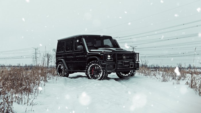 Black Mercedes G-Wagon in Snowy Field