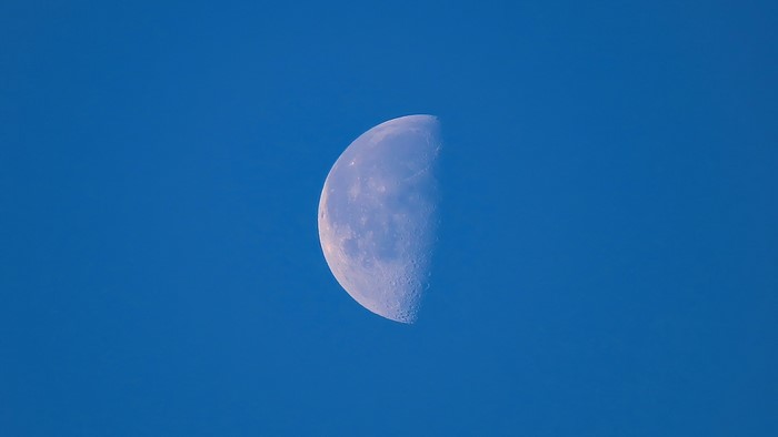 Half Moon in Blue Sky