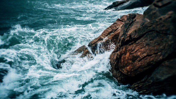 Waves crashing against rocks