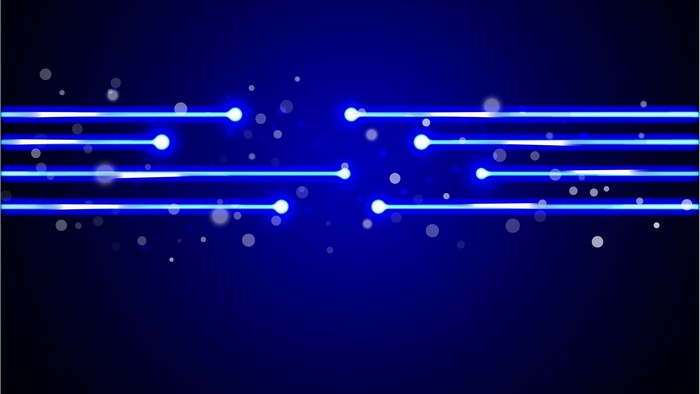 Blue light streaks with bokeh on dark background