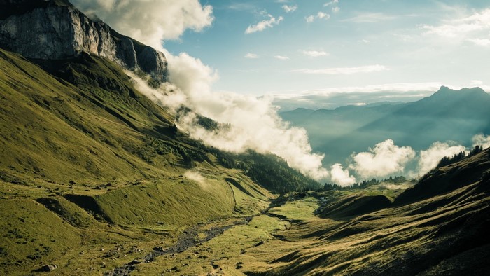 Valley with mountains and clouds