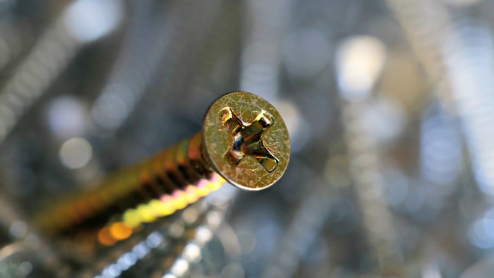 Close-up of a gold screw head