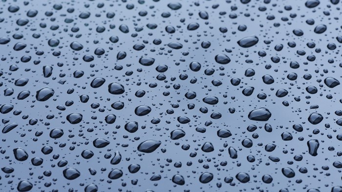 Water Drops on a Dark Surface