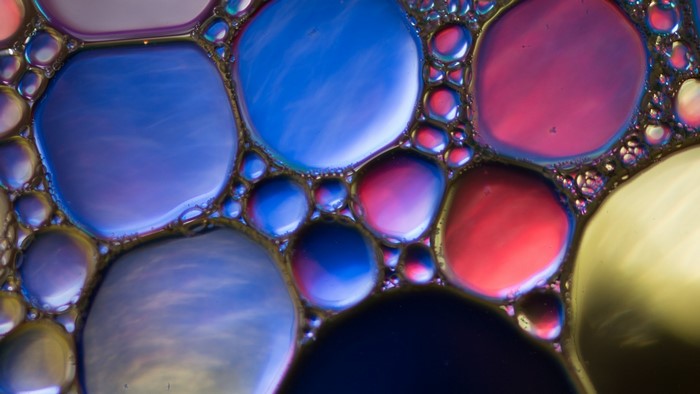 Abstract macro photography of colorful oil and water bubbles