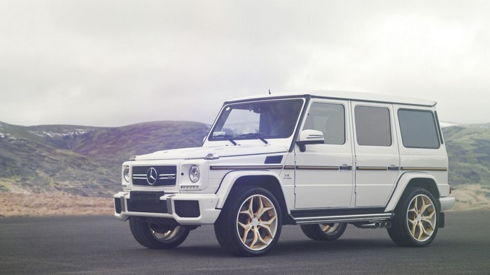 White Mercedes-AMG G-Wagon with gold accents