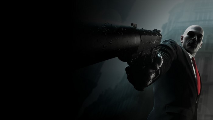 Agent 47 from Hitman holding a gun