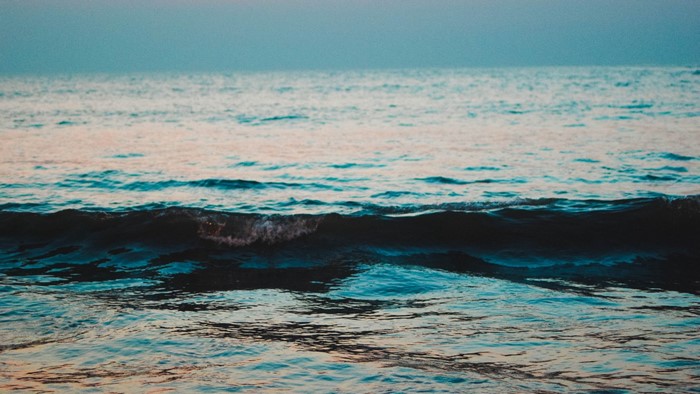 Ocean waves at dusk