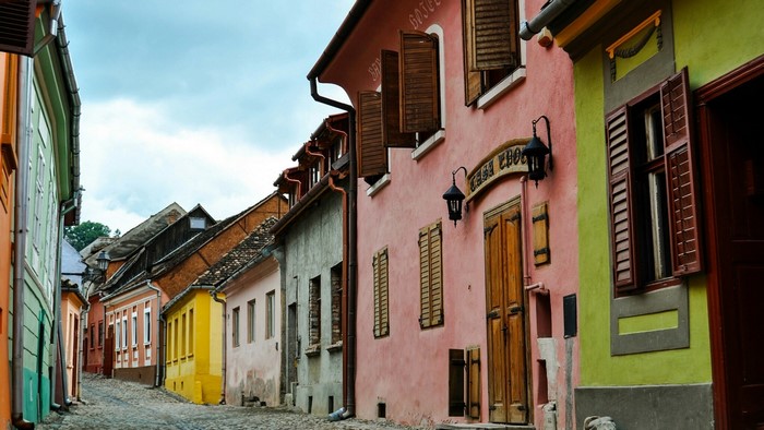 Colorful buildings on a cobblestone street