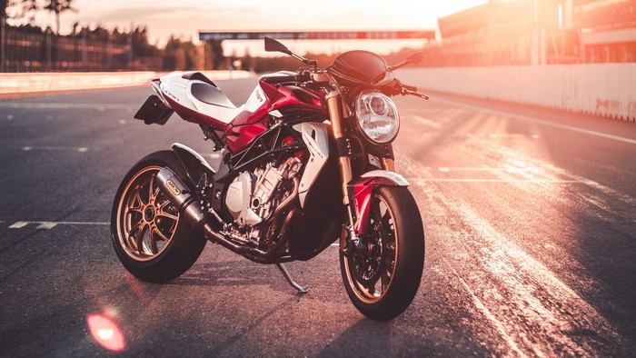 Red and white MV Agusta sportbike on a racetrack