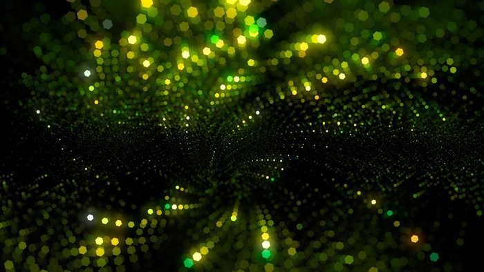 Green and yellow bokeh lights abstract background