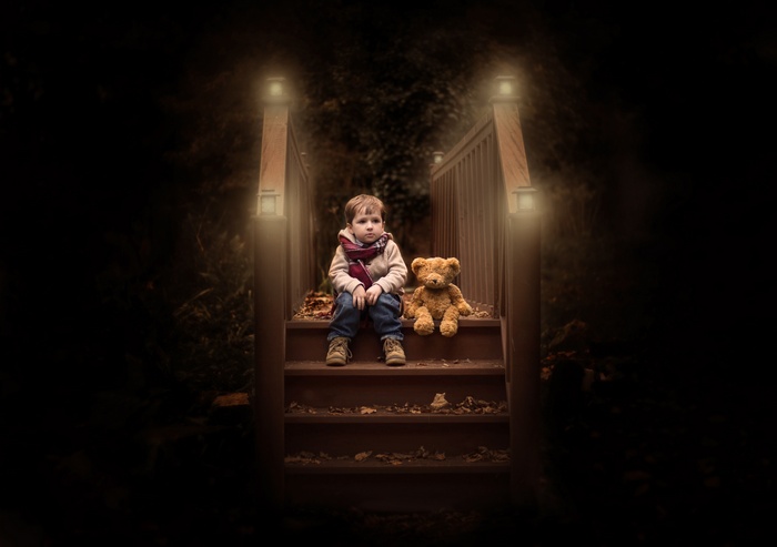Boy and Teddy Bear on Autumn Stairs with Lights 4K