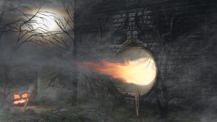 Halloween graveyard with pumpkin and fire