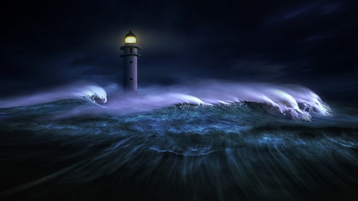 Lighthouse in a stormy ocean at night